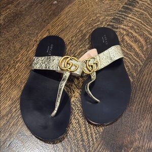 Gucci Black and Gold Sandals with Iconic Logo